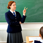 "Septante" and "Nonante"**

A friendly classroom scene in Brussels, Belgium. A teacher, fully clothed in professional attire, stands in front of a chalkboard displaying "70 = Septante" and "90 = Nonante." Students in modest school uniforms are attentively listening. The classroom is bright and welcoming. Safe for work, appropriate content, family-friendly, perfect anatomy, correct proportions, well-formed hands, proper finger count, natural body proportions, professional illustration, high quality.

**